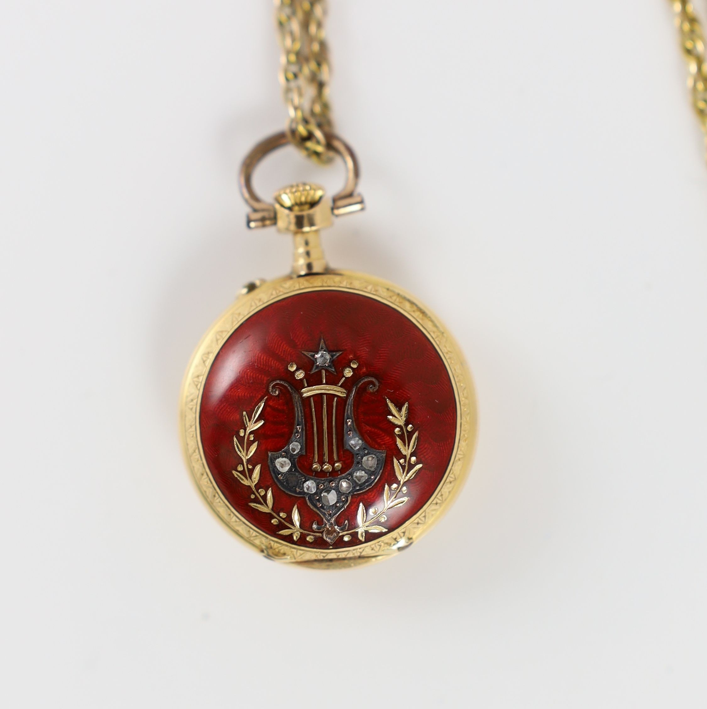 A lady's early 20th century continental 18k gold, red enamel and rose cut diamond set open face fob watch